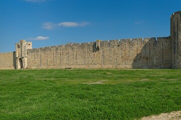 wall with strong towers in Aigues-Mortes in France