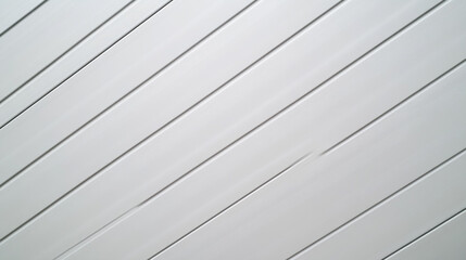 A close up shot of a white wooden plank wall with diagonal lines and soft shadows on the surface