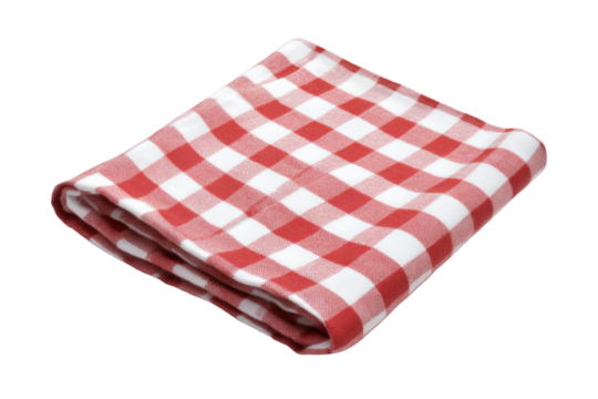 Folded red and white checkered tablecloth on black background, cut out