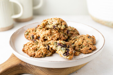 Homemade oatmeal cookies with cranberries and pumpkin seeds. Healthy diet snack.