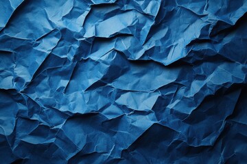 Fototapeta premium Crumpled Blue Paper Background for Textured Design Elements