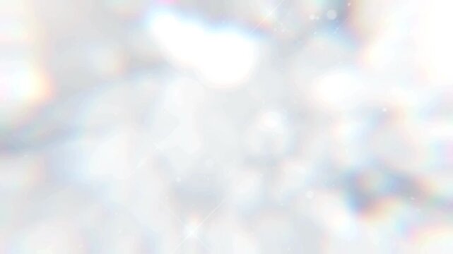 シルバー系のキラキラ素材が奥から手前にゆっくり移動する
