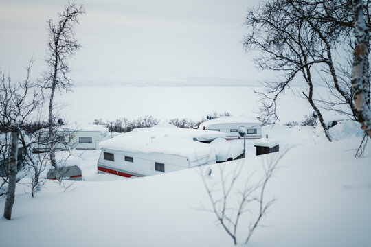 Caravans in snowy hiking area in Kilpisjarvi, Finnish Lapland winter.