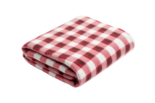 Folded red and white checkered blanket on black background, cut out