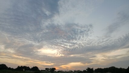 Beautiful gray clouds form at sunset