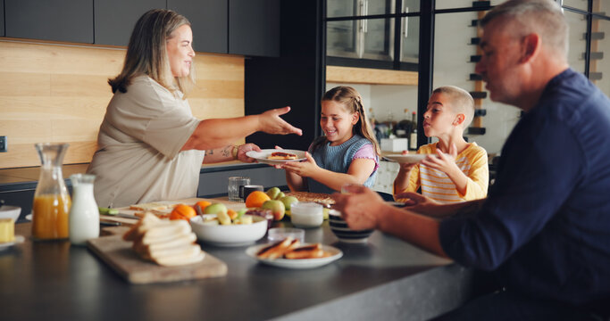 Parents, children and serving breakfast in kitchen with healthy food, sandwich and eating together. Happy family, people and kids with lunch meal in home for hunger, wellness and bonding at table