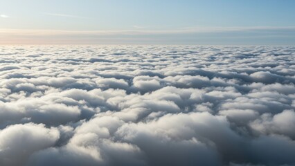 Naklejka premium Vast expanse of fluffy white clouds under a calm blue sky.