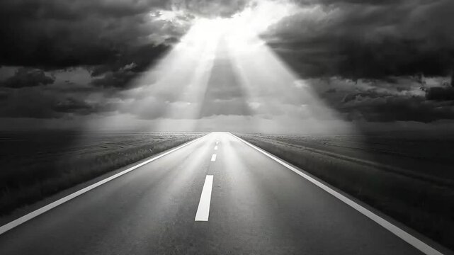 Road leads to sky with bright rays piercing dark clouds, path ahead