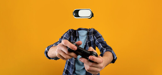 A person actively utilizes virtual reality goggles and a gaming controller with no visible head or...