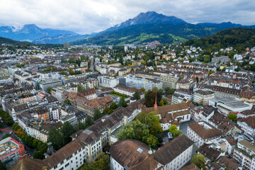Stunning aerial footage of Kapellbrücke, the iconic Chapel Bridge, showcasing the picturesque...