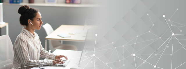 Confident woman office worker working on modern computer in office, sitting at workplace. Ceo lady typing on keyboard, enjoying online job, free space