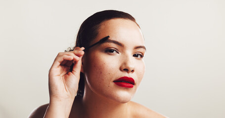 Beauty, girl or brush eyebrow in studio for makeup application, face transformation or portrait....