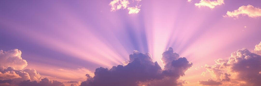 Purple and pink clouds fill the sky at sunset - Powered by Adobe