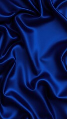 Obraz premium Beautiful dark blue silk satin background. Soft folds on shiny fabric. Luxury background with copy space for text, design. Web banner. Flat lay, top view.