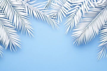White paper palm leaves on a light blue background