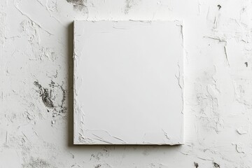 Blank canvas with texture on wooden easel against textured wall for minimalist product display in neutral lighting