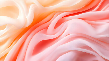 Fototapeta premium Soft, flowing fabric in ombre peach and pink tones