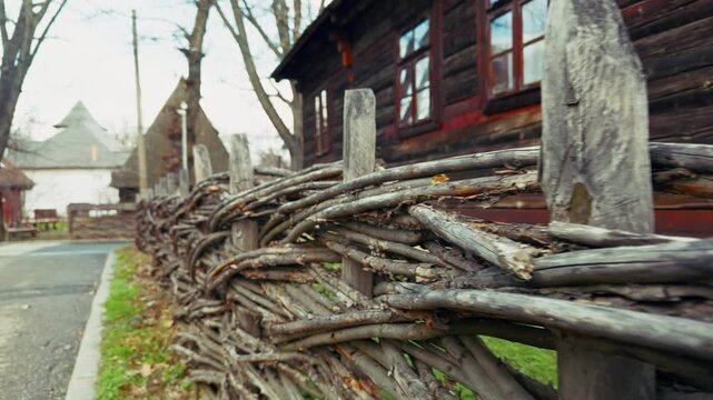 Intricate Wooden Fance To Protect Traditional House 