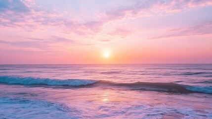 Fototapeta premium Pink Sunset Over Ocean Waves
