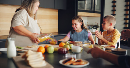 Mother, children and serving breakfast in kitchen with healthy food, pouring juice and eating...