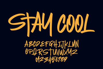 Modern handwritten graffiti-style font in bold orange with full uppercase alphabet and number set, all on a dark background—ideal for streetwear, urban branding, or edgy design. © Memet
