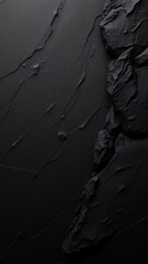 Black abstract grunge backdrop for your design. Dark rock texture. Part of the mountain close-up.