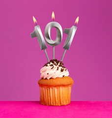 Birthday card on violet background - Candle number 101