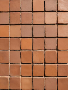Top view of reddish brown rustic natural stoneware outdoor floor. Classic rough anti-slip matte terracotta ceramic square tiles for paving, terrace, porch, patio, pool exterior texture background.