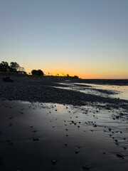 Stoney beach and sunset, Waitara, Taranaki, New Zealand