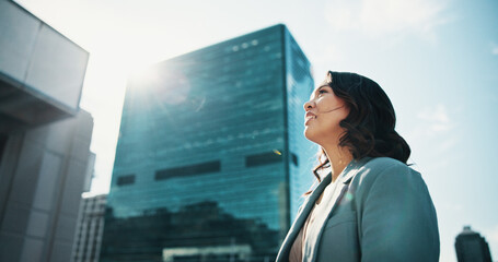 Professional, thinking and business Asian woman in city with idea, brainstorming and career...