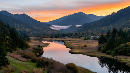 Fototapeta premium Scenic Mountain Valley Landscape Reflected In Calm Lake Water During Sunset With Golden Sky And Peaceful Atmosphere