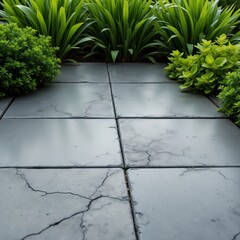 A serene garden pathway surrounded by lush greenery and plants.