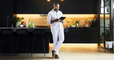 Kitchen, search and tablet with black man in home as real estate agent for design ideas or...