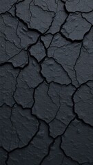 Black rock texture. Rough mountain surface with cracks. Close-up. Stone background with space for design.