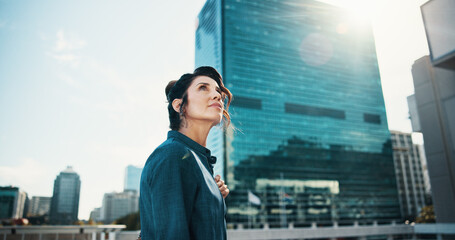 Travel, thinking and business woman in city with idea, brainstorming and career insights....