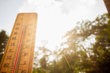 Thermometer background is blue sky Content on global warming