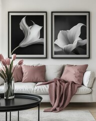 Monochrome flower prints above a modern sofa.