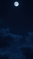 Obraz premium Dark blue abstract background. Night sky with clouds and moonlight. Navy blue sky background with copy space for design. Web banner.