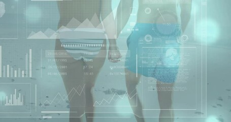 Couple walking on beach with digital data and graphs overlay animation - Powered by Adobe