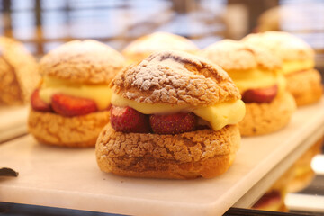 Strawberry-topped cream pastries at the bakery