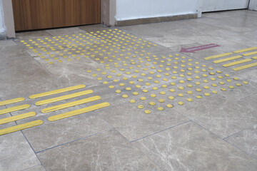 Textured surface markings guide safe movement in public space