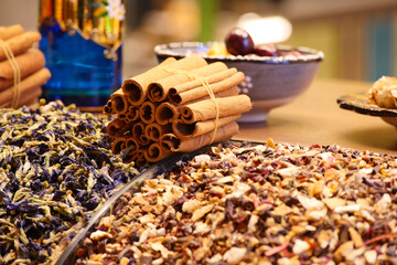 Spices and dried herbs displayed in a vibrant market setting