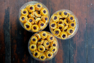 thumbprint cookies with blueberry jam in jar