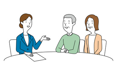 女性の相談員にアドバイスを聞く高齢の男女