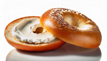 Bagel Delight: A close-up of a fresh, sesame seed-topped bagel, sliced and generously spread with creamy, smooth cream cheese, showcasing a delicious and satisfying breakfast or snack.