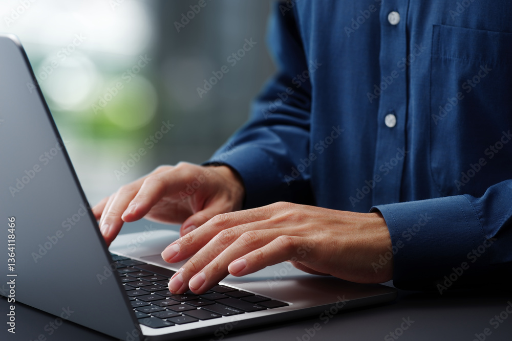 Fototapete Hands typing on laptop computer keyboard. Businessman working at desk in office. Using technologies in business.