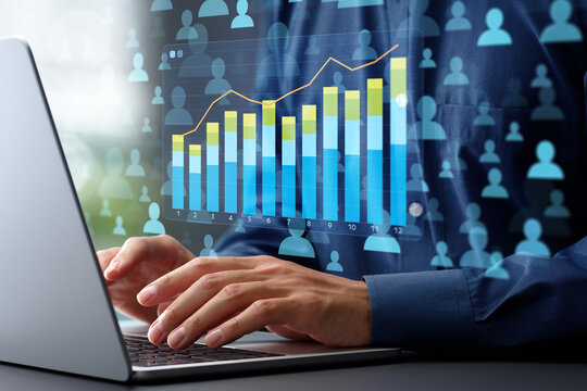 Web analytics and statistical marketing strategy. Page view and conversion rate graph and customer icons. Analyst using laptop computer to analyze data.