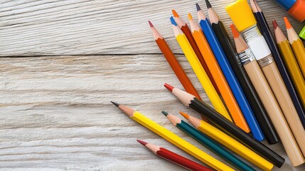Obraz premium Vibrant bunch of colored pencils arranged neatly on a white surface ready for creative artwork