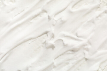 Texture of white cream as background