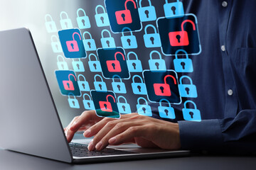 Security vulnerability and network monitoring. Penetration testing for vulnerability and data protection. Security audit using laptop computer to assess system security.